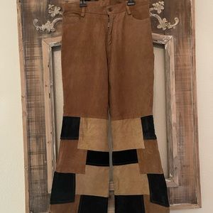 Leather pants with color block on the ends.